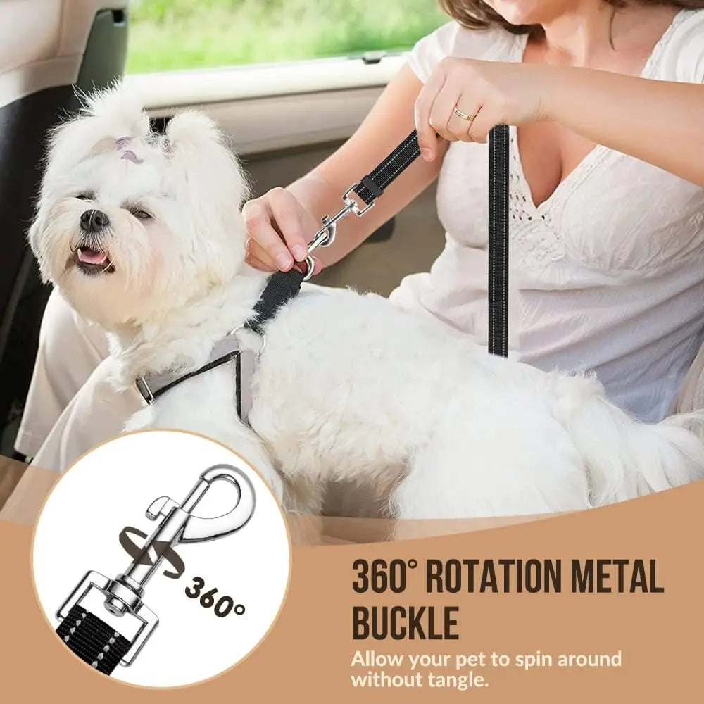 Close-up of the 360 degree swivel snap hook being clipped to a dog's harness