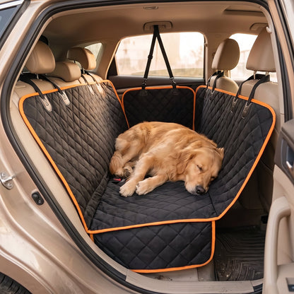 The quilted cover fitted across a rear car bench seat with side flaps down and a dog asleep on it